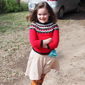 Sewing Helper in hand-knitted fox jumper.